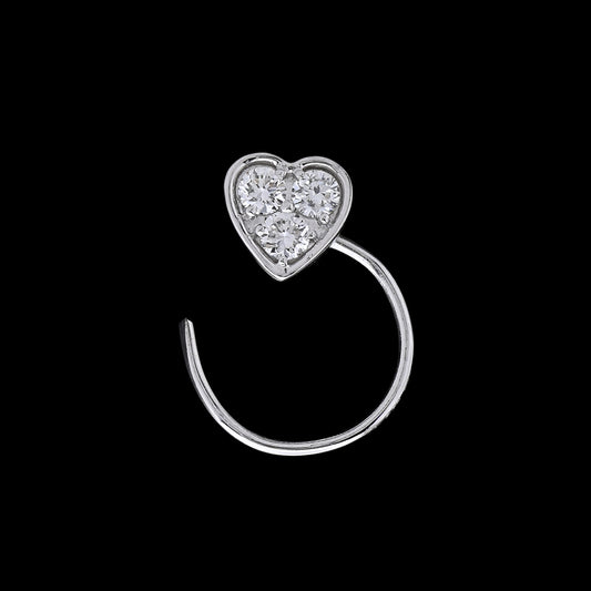 Dainty silver nose ring featuring a heart-shaped diamond cluster, radiating charm and elegance. A delicate creation by jnjbymadhuri.