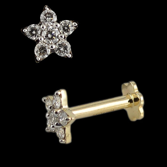 Dainty floral diamond nose stud set in a gold base, showcasing five radiant petals for a timeless look. A minimalist yet luxurious piece from jnjbymadhuri.
