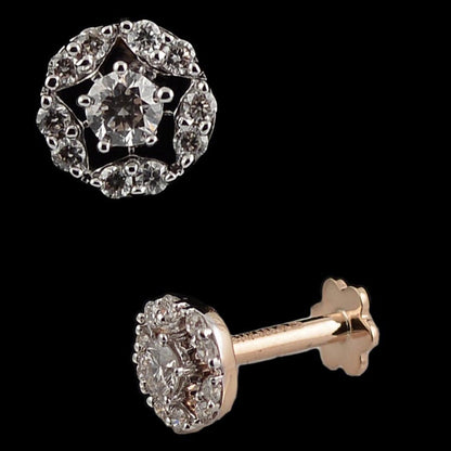 Elegant stud earring featuring a floral-inspired diamond cluster design, exuding timeless grace. A refined piece by jnjbymadhuri.
