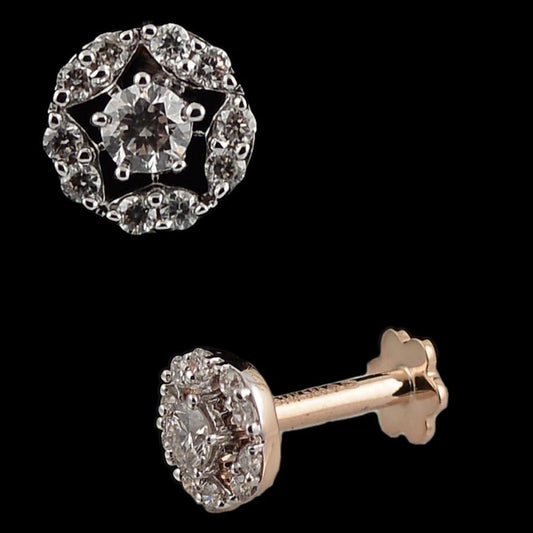 Elegant stud earring featuring a floral-inspired diamond cluster design, exuding timeless grace. A refined piece by jnjbymadhuri.
