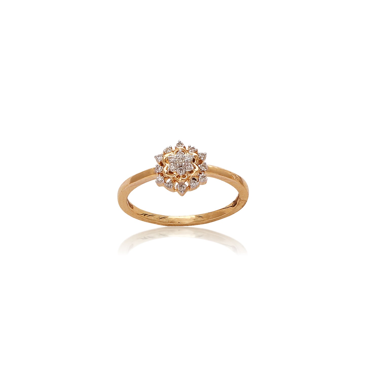 Delicate gold ring by jnjbymadhuri featuring a floral-inspired cluster of round-cut diamonds set in a symmetrical bloom pattern, showcased on a clean white background.
