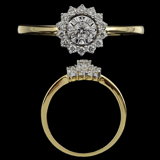 Gold ring with a floral cluster design featuring a central round diamond surrounded by multiple layers of smaller diamonds, shown from the top and side views against a black background.
