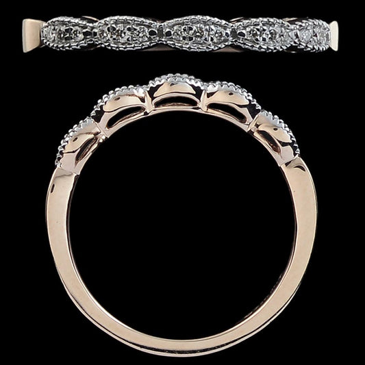 This elegant ring from jnjbymadhuri echoes the design language of the previous piece, featuring alternating marquise-shaped and round motifs encrusted with diamonds. The design is more intricate, with added milgrain detailing around each setting for a vintage-inspired finishāperfect as a standalone piece or for stacking with other rings.