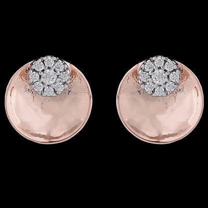 A close-up of rose gold stud earrings with a sparkling cluster of diamonds on top, set against a bold black background. Gracefully designed by jnjbymadhuri.
