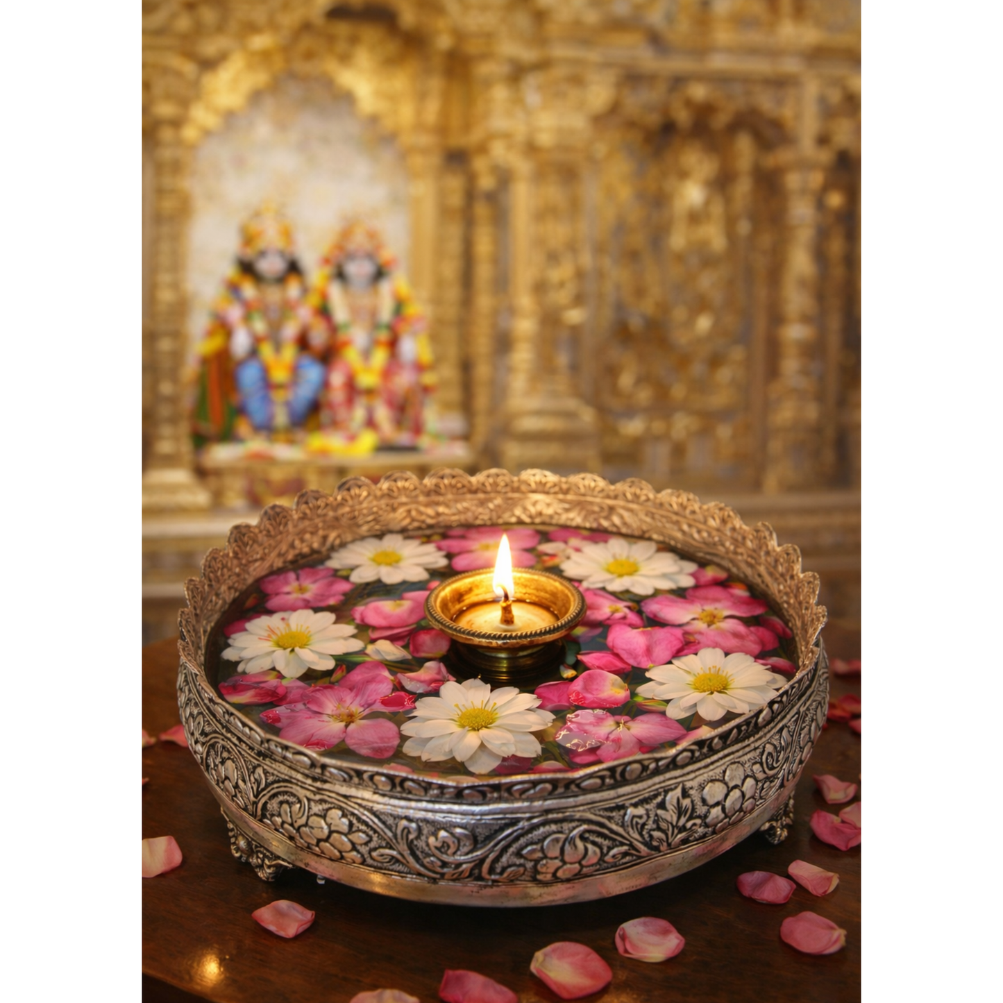 Antique Floral Urli by JNJ by Madhuri, featuring intricate floral detailing and an antique finish, perfect for luxury home décor, festive celebrations, and elegant traditional styling.
