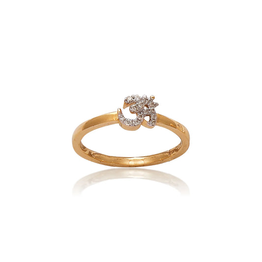A gold ring featuring a finely detailed diamond-studded "Om" symbol at its center, reflecting spiritual elegance and minimalism, presented on a clean white background to enhance its brilliance and craftsmanship, from jnjbymadhuri.
